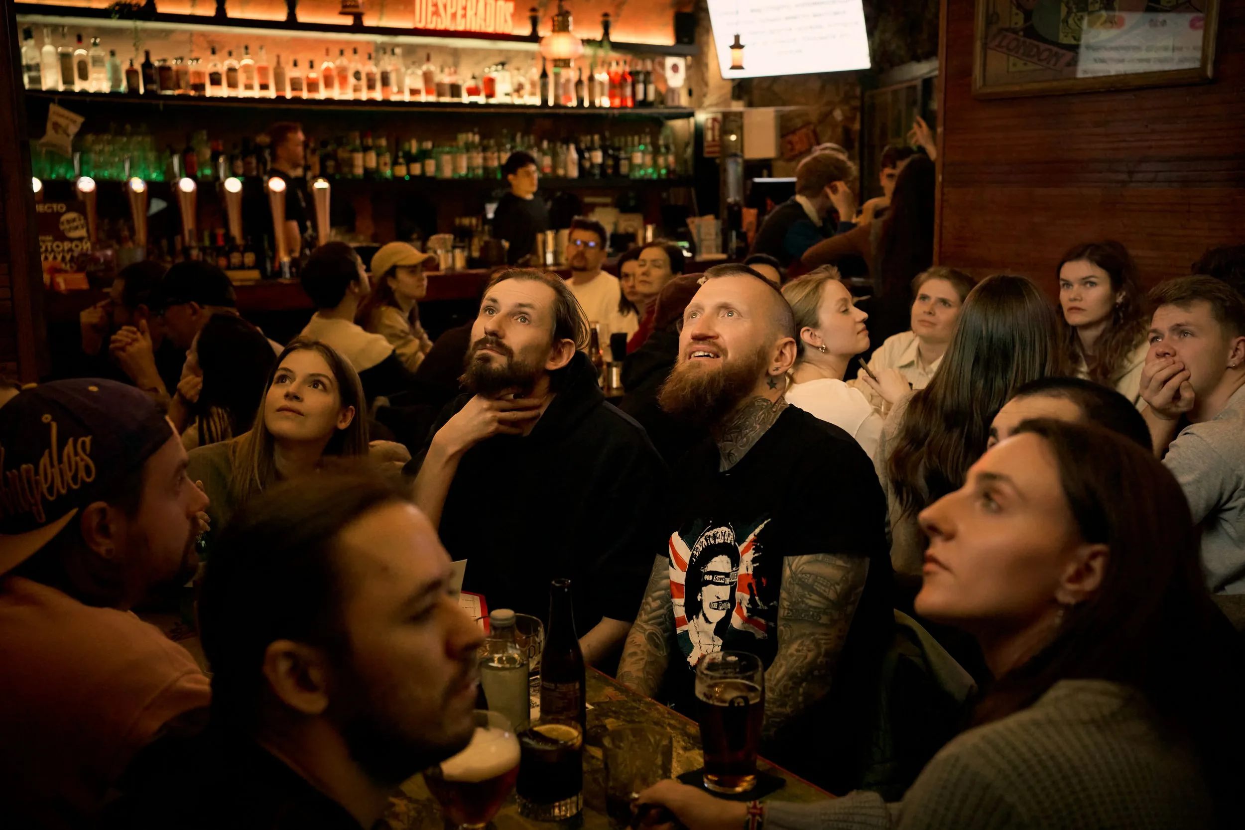 Wild Rover Barcelona sports bar – packed crowd watching live sport on 9 HD screens